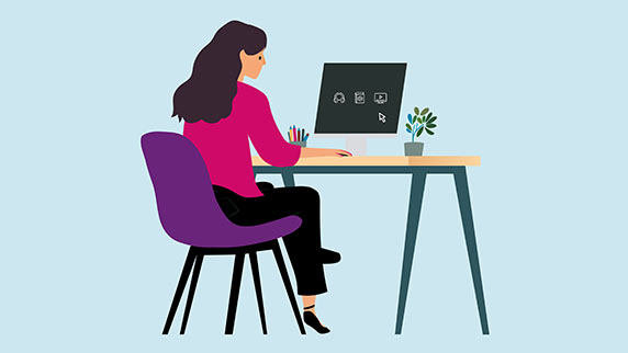 Woman at desk on laptop