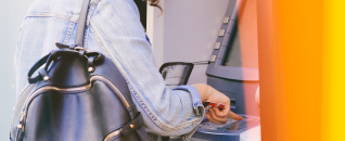 Lady using cashpoint