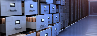 Row of filing cabinets with drawers open