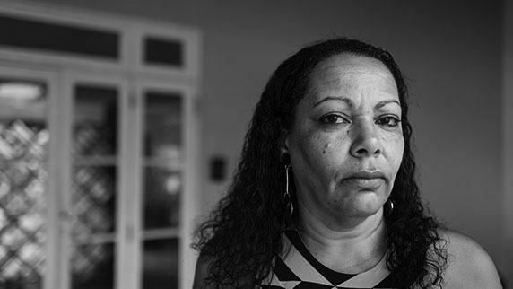 Lady in front of glass doors