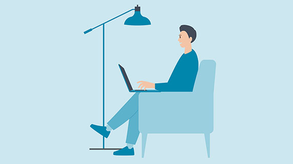Man at desk on laptop