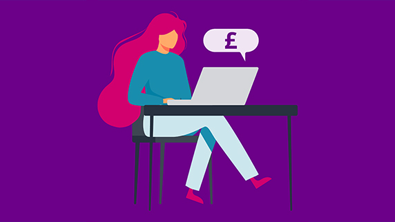 Red haired woman at laptop