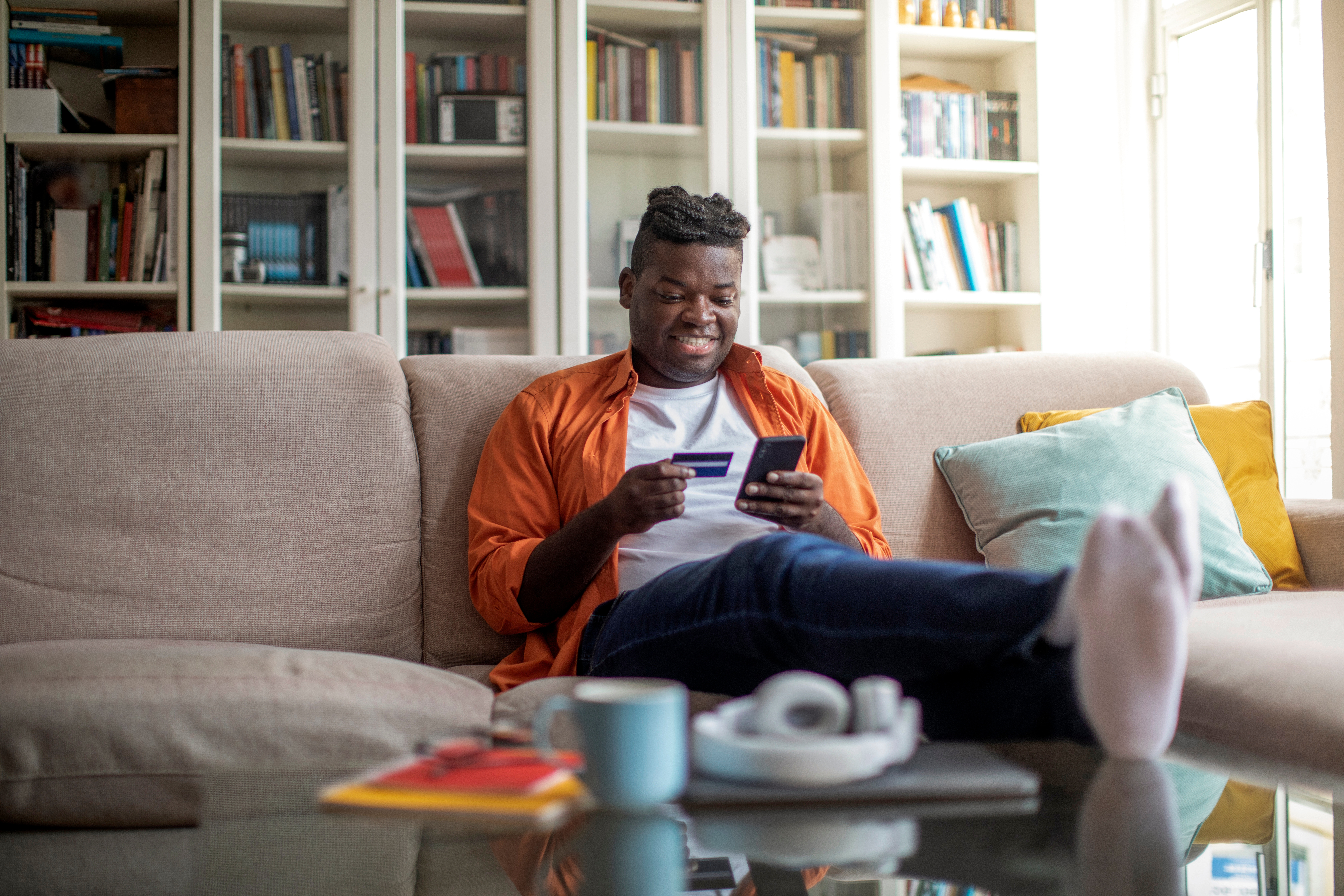 Photo of male on couch