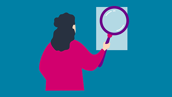 Woman with a big magnifyin glass